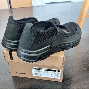 Salomon Black Athletic Shoes with Breathable Mesh and Slip-On Design